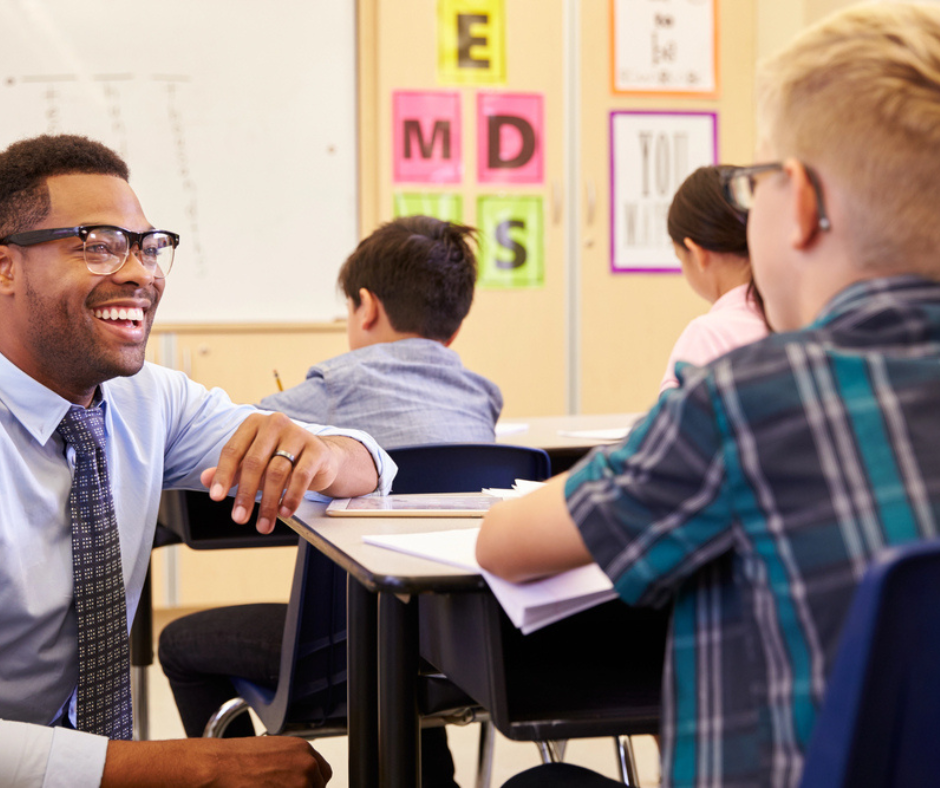 teacher interacting with student